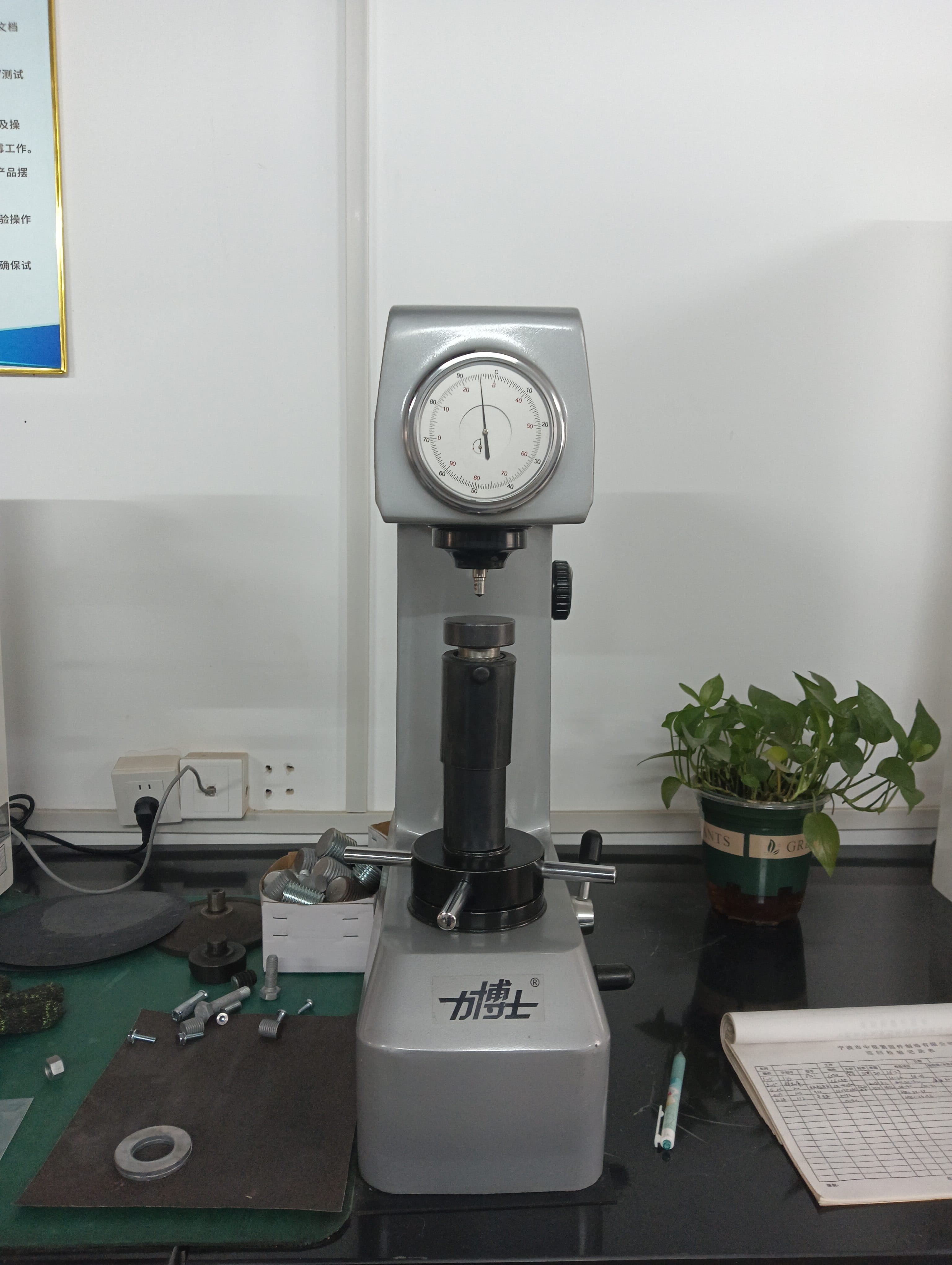 ALT="Fastener quality inspection at SINOFASTENER laboratory - ISO 9001 certified testing facility"
